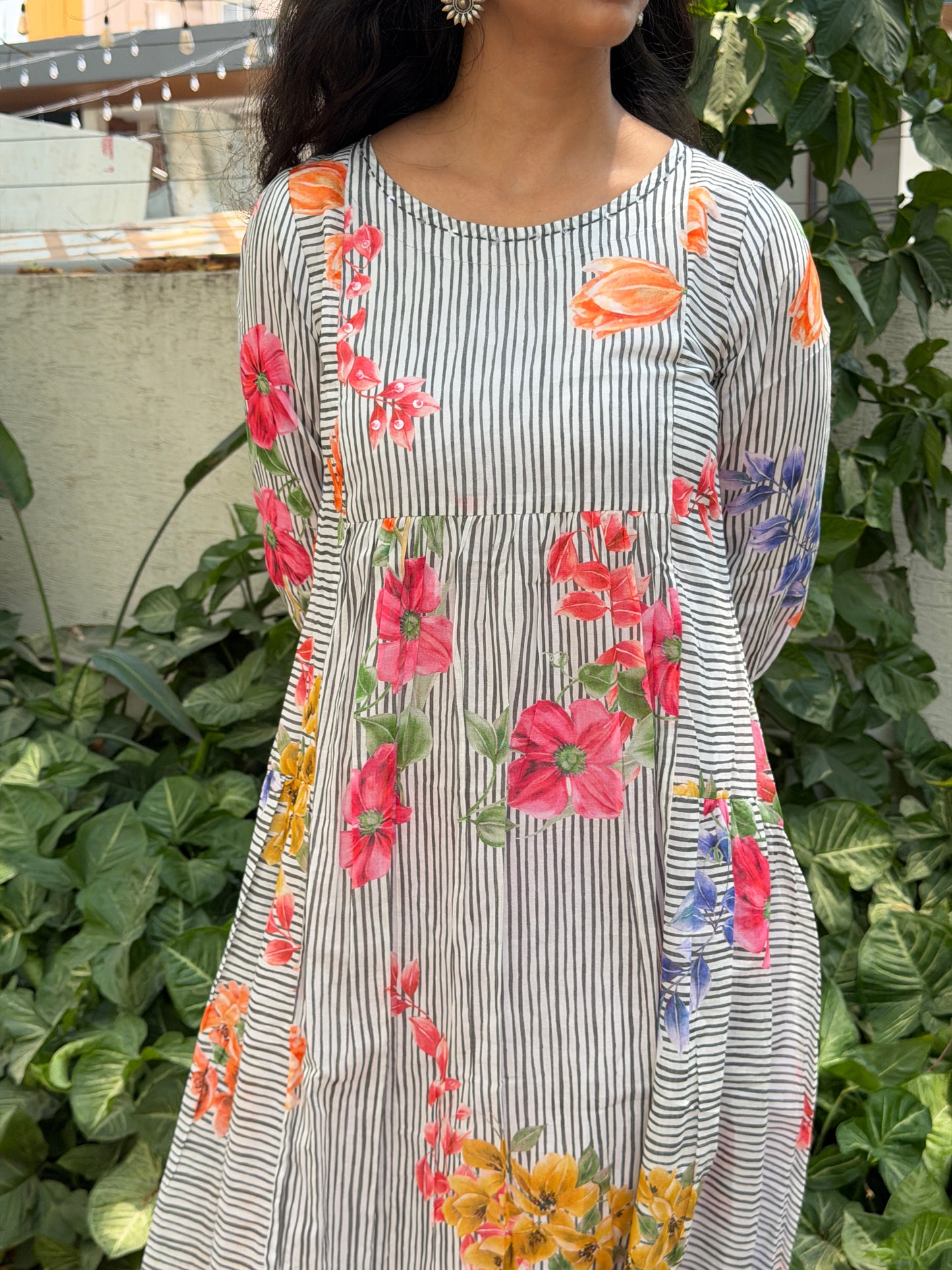 A0740 black stripes mul cotton frock with floral digital printed butties all over the dress