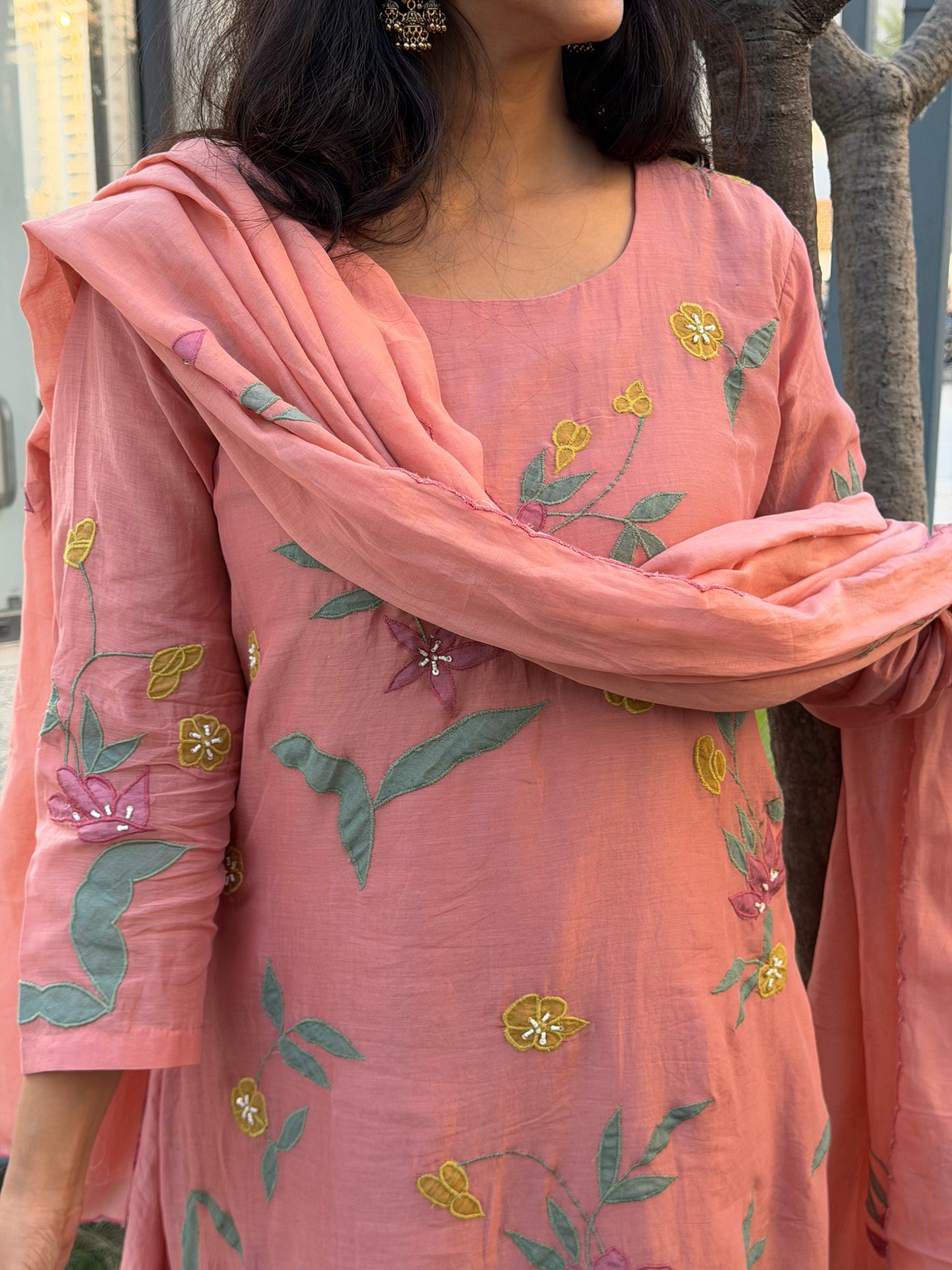 A0609 peach shade mul Chanderi 3pc with beautiful appliqué work detailing