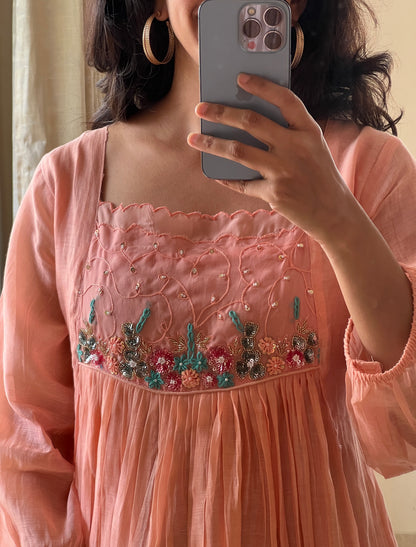 A0462 peach mul chanderi one piece dress with hand embroidery detailing on yoke part