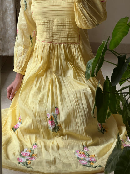 A0488 yellow Mulmul one piece dress with hand embroidery detailing at the bottom & pleats at the yoke part