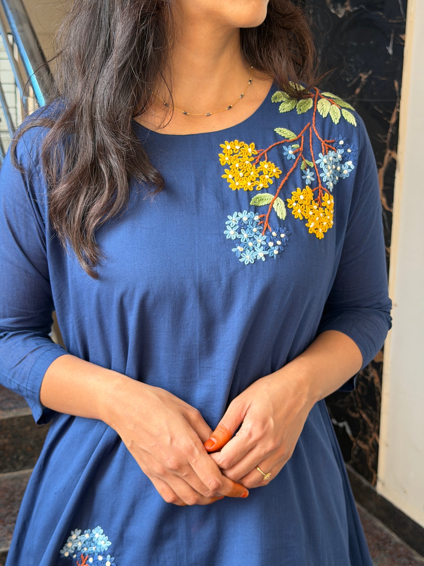 A0812 Mul cotton cord set with hand embroidery detailing.