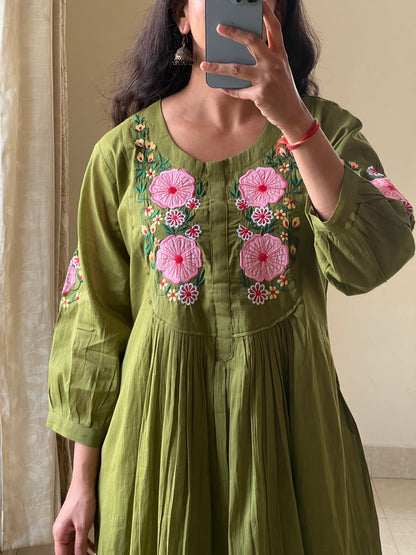 A0644 green Mulmul one piece dress with applique work detailing on yoke part