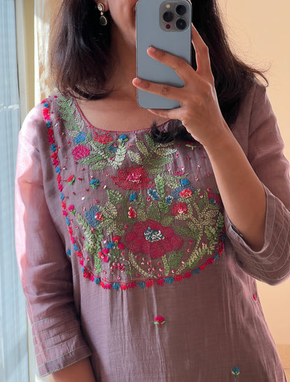 A0546 brown mul chanderi 2 piece dress with Kantha work detailing on yoke part & butties all over the dress