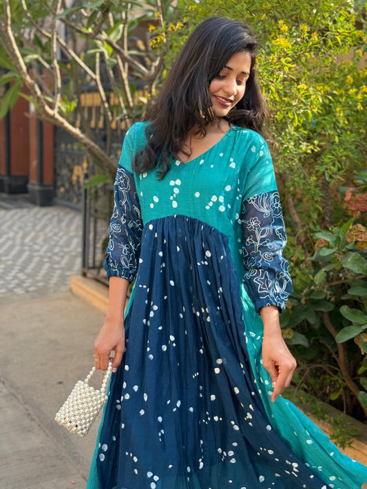 A0444 This stunning block-printed dress is crafted from a luxurious blend of premium MulChanderi fabric. Experience the ultimate in eco-friendly fashion and artistic detail of Block print.