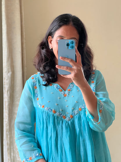 A0494 blue mul chanderi one piece dress with hand embroidery detailing on organza yoke part & hands