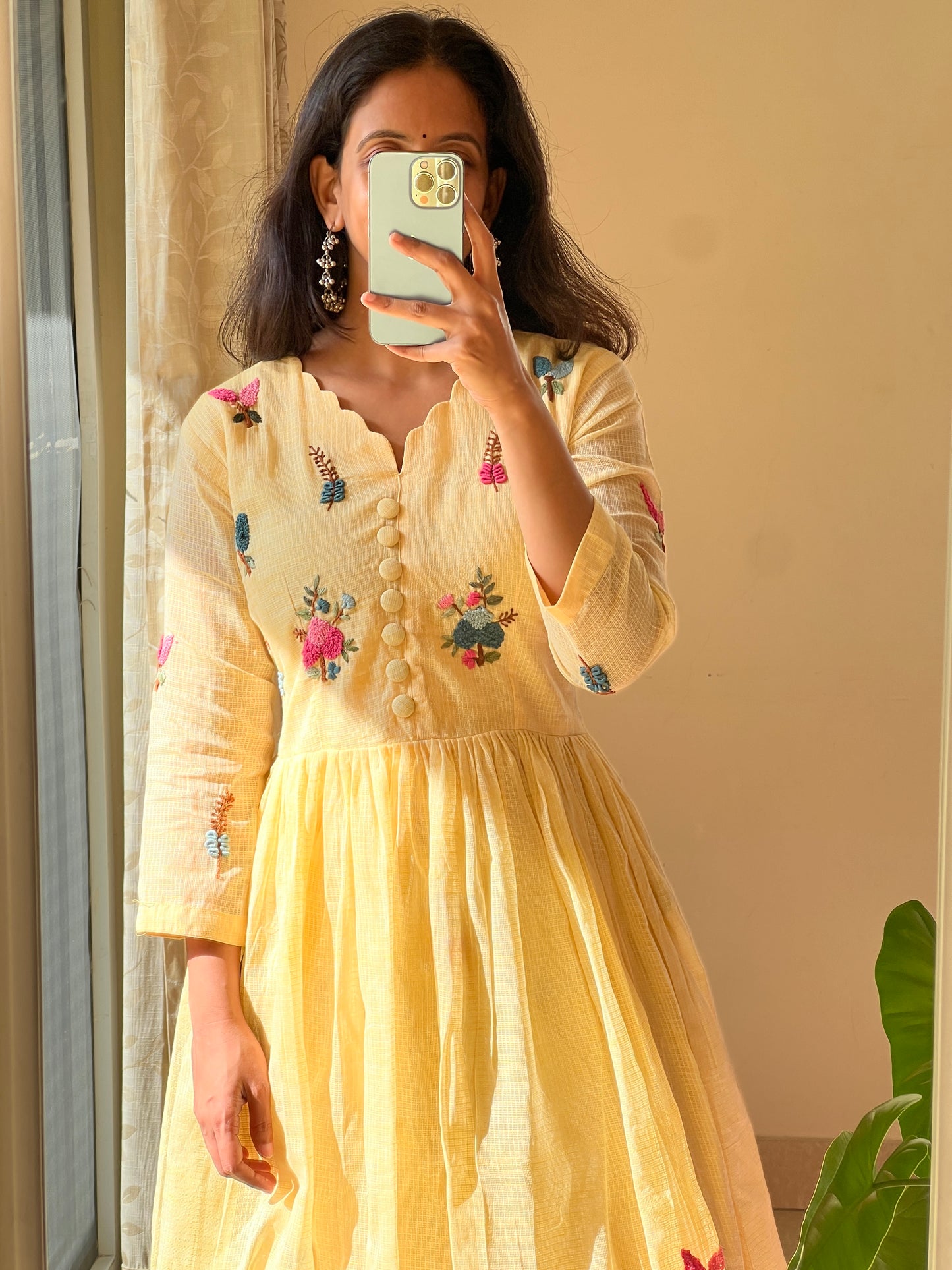 A0463 yellow Kota one piece dress with hand embroidery detailing all over the dress