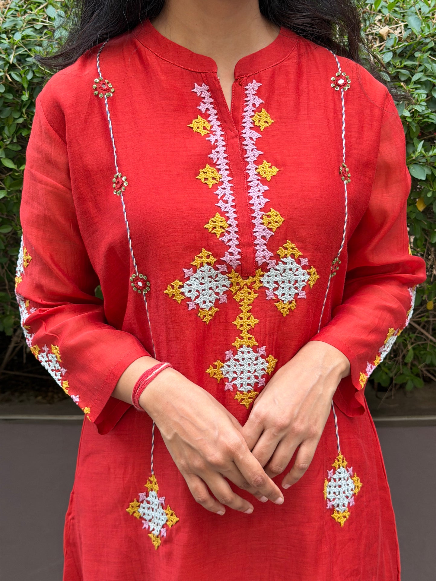 A0673 rust mul Chanderi 2 piece set with Kutch work hand embroidery detailing all over the top