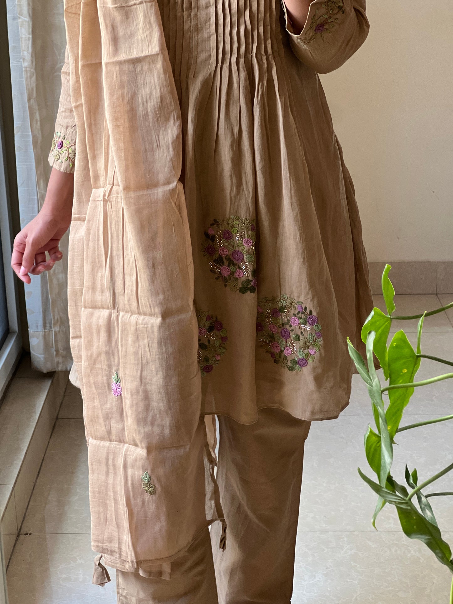 A0409 Trending Chikku colour Mulmul 3 piece set with hand embroidery and pleats detailing