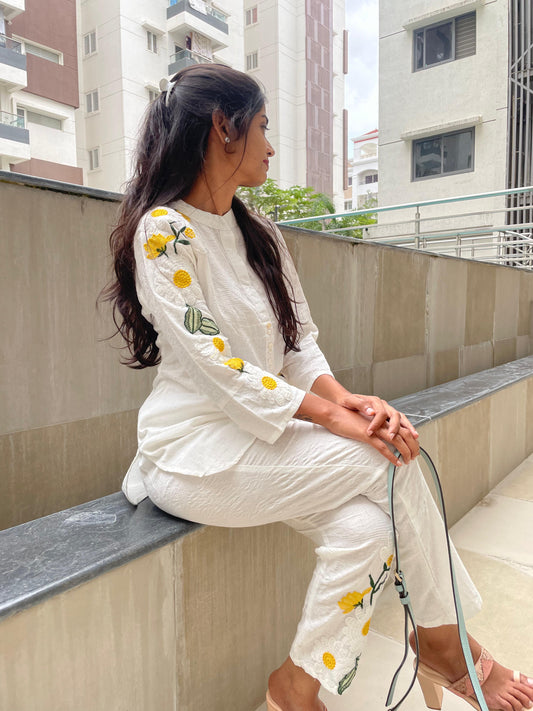 A1525 white premium cotton self weaved coord set with yellow floral hand embroidery