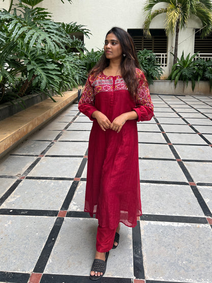 A0538 red mul chanderi 2 piece dress with hand embroidery detailing on yoke part with mirrors & Kantha work