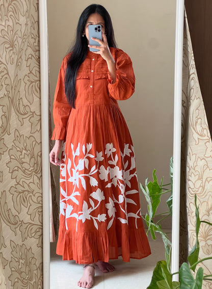 A0419 Mulmul Rust shade frock with applique work and pleats detailing, comes with complete cotton lining