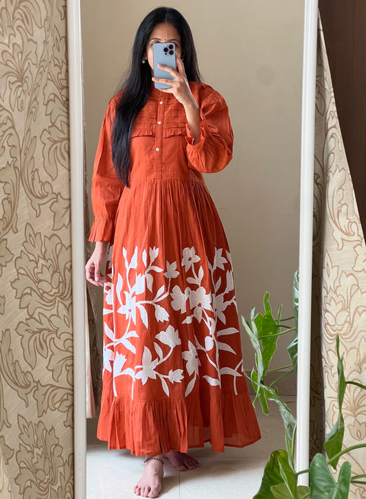 A0419 Mulmul Rust shade frock with applique work and pleats detailing, comes with complete cotton lining